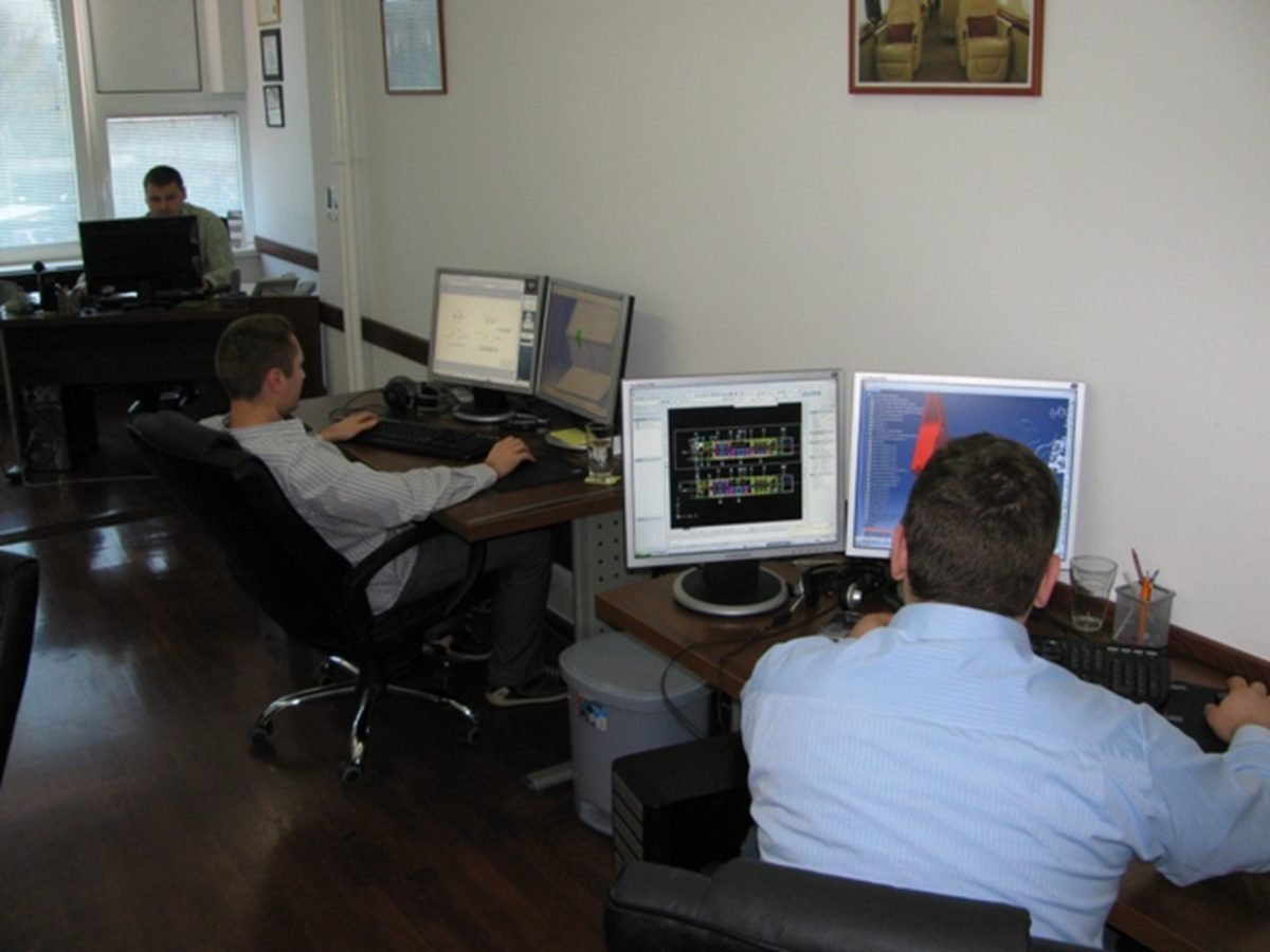 TGT engineers working on CATIA V5 CAD workstations
